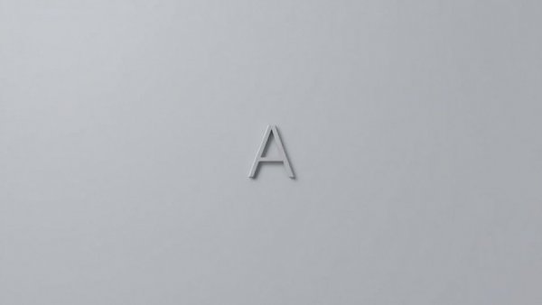 Minimalist letter A on gray backdrop.