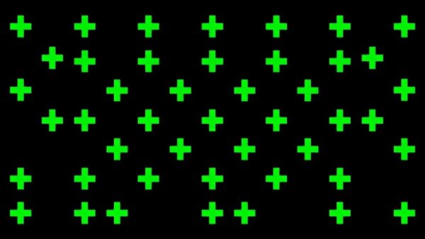 Abstract grid pattern of dark green plus signs on black