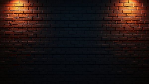 Dark textured brick wall in dim lighting