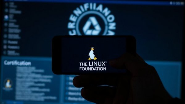 Image of the Linux Foundation logo on phone, open governance for agentic AI.
