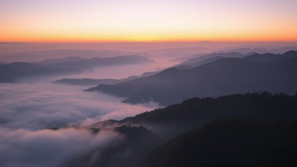 Breathtaking sunrise in Burnsville, NC with misty mountains.