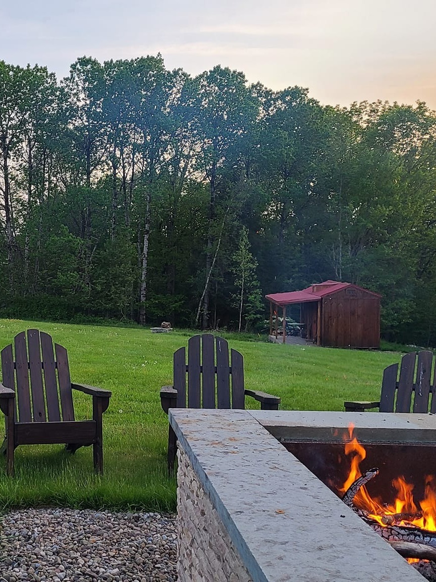 snow-capped peaks, serene, climbers ascending towards the summit, photorealistic, crisp frost adorns the rocks, highly detailed, wisps of mist rising from the valleys, ISO 200, icy blues and whites, high contrast lighting, shot with a panoramic lens.