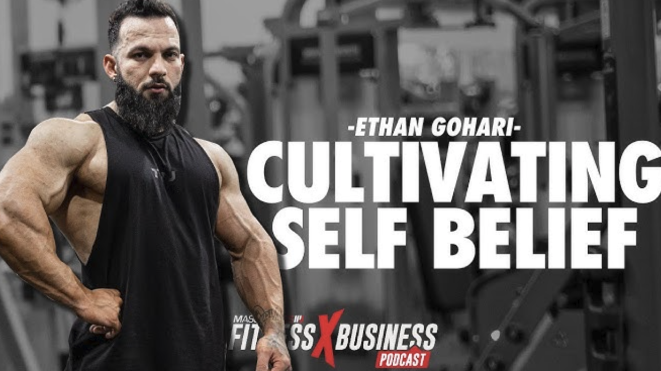 Man performing intense chest workout in gym environment.