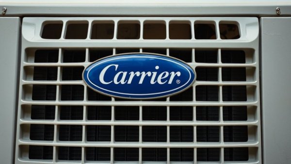Carrier air conditioning unit grille with brand logo close-up.