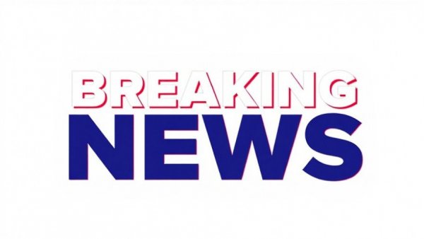 Breaking news graphic in blue and white bold typography.