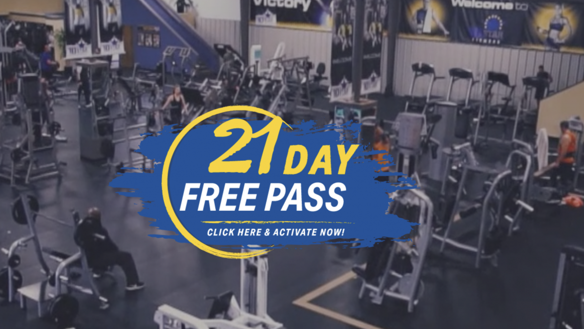 Ultra-fit personal training at a modern gym with active visitors and advanced fitness equipment.