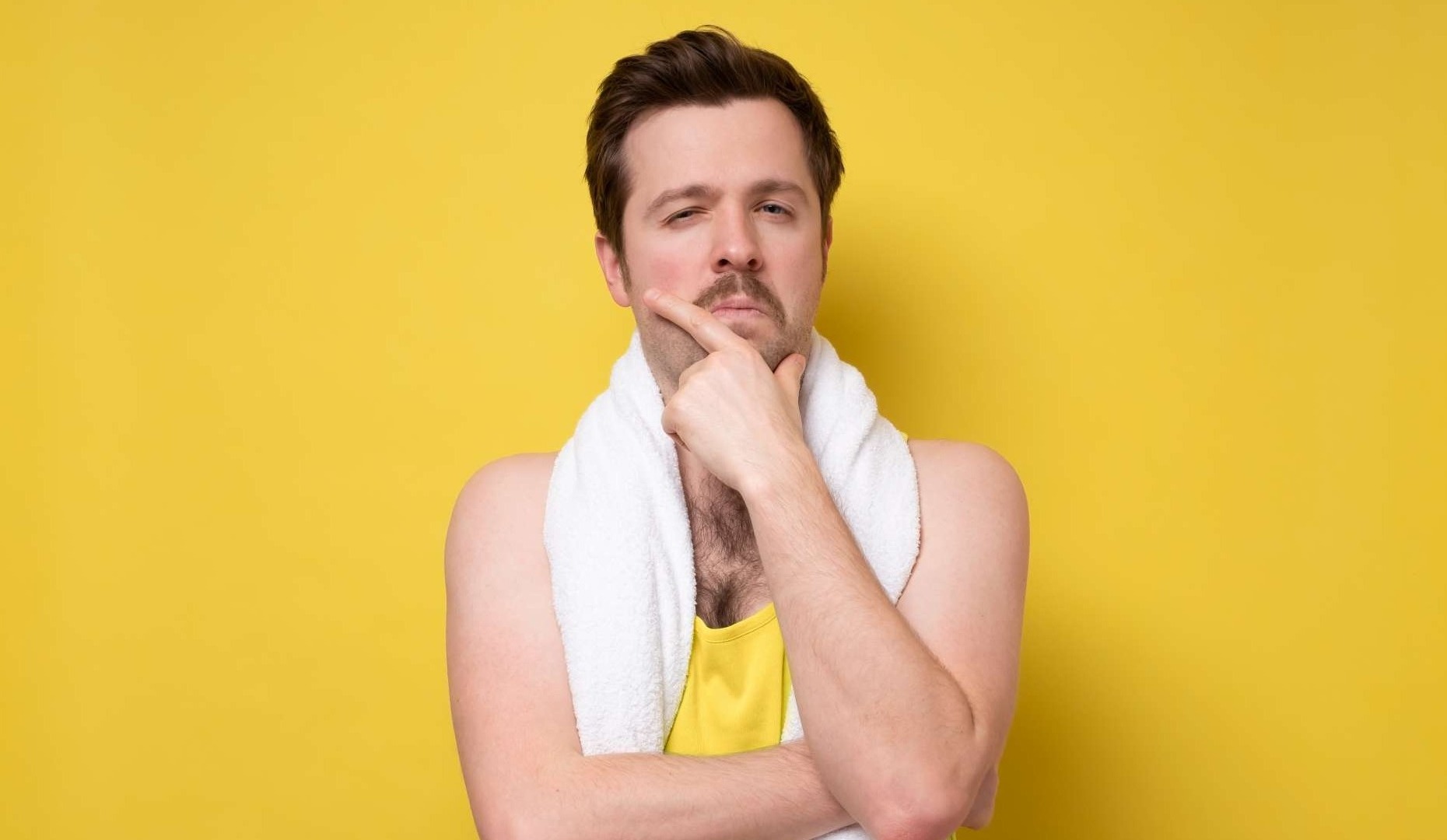 Diverse fitness group analyzing workout plans in a modern gym setting — fitness, workout routine, health and fitness industry