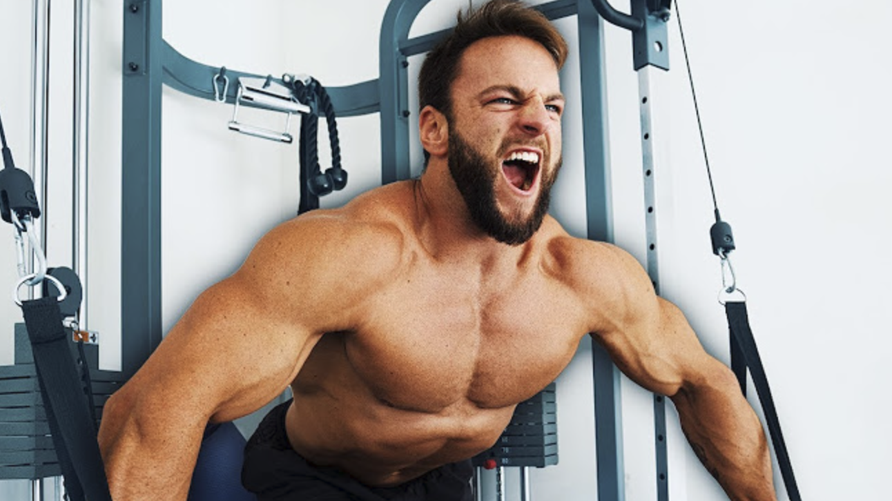 Determined man performing cable workouts for upper body strength in cinematic gym setting.