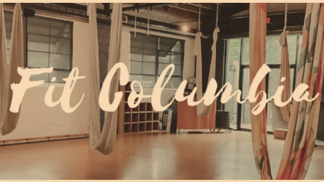 Yoga-themed cookies with FIT Columbia logo and aerial yoga classes designs