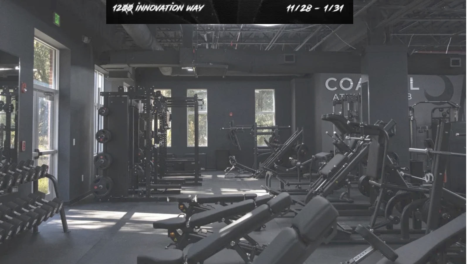 Modern gym with equipment for free trial membership, bright clean space