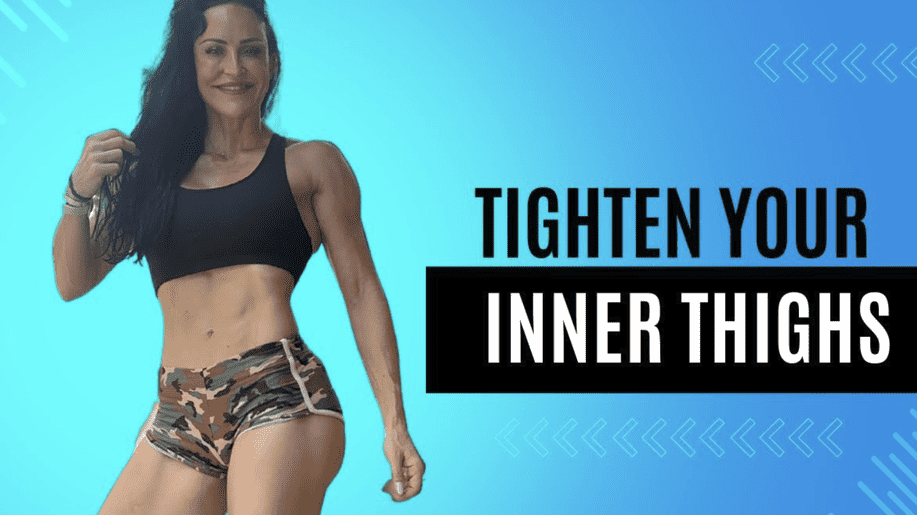 Athletic woman sculpting legs with bodyweight exercises in early morning light.