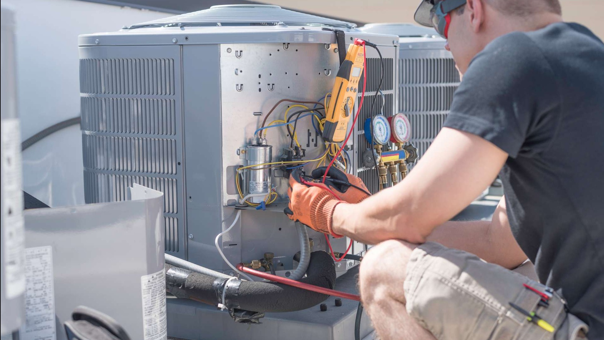 Technician adjusting filling equipment controls, total cost of ownership.