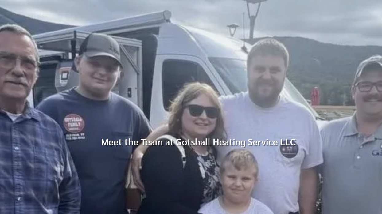 Concerned homeowner examining wall thermostat in bright, modern living room.