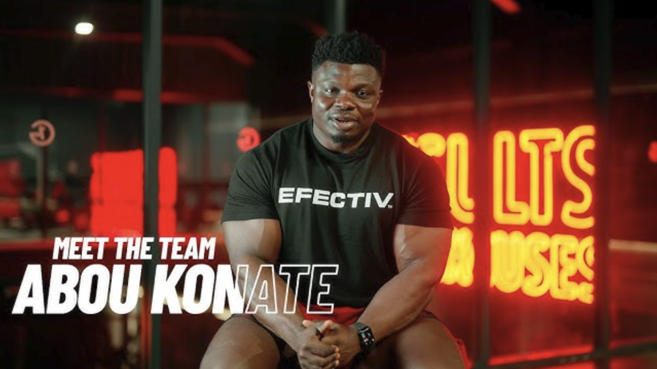 Abou Konate Arnold UK 2026 bodybuilding in professional gym.