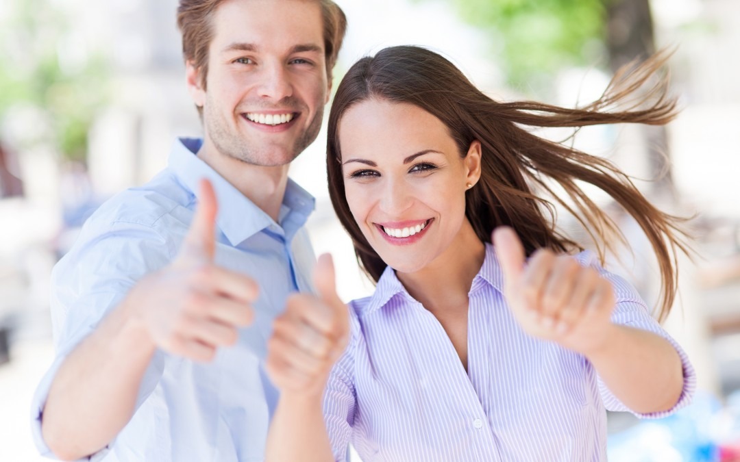 man and woman smiling