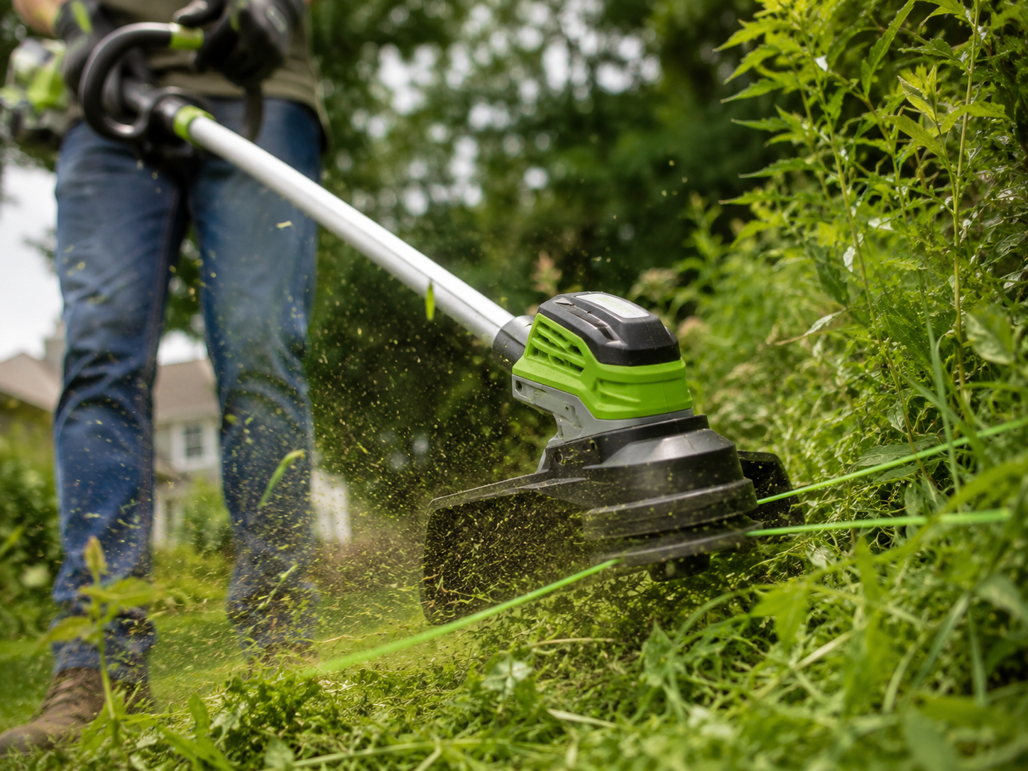 Lawn trimmer in action outdoors