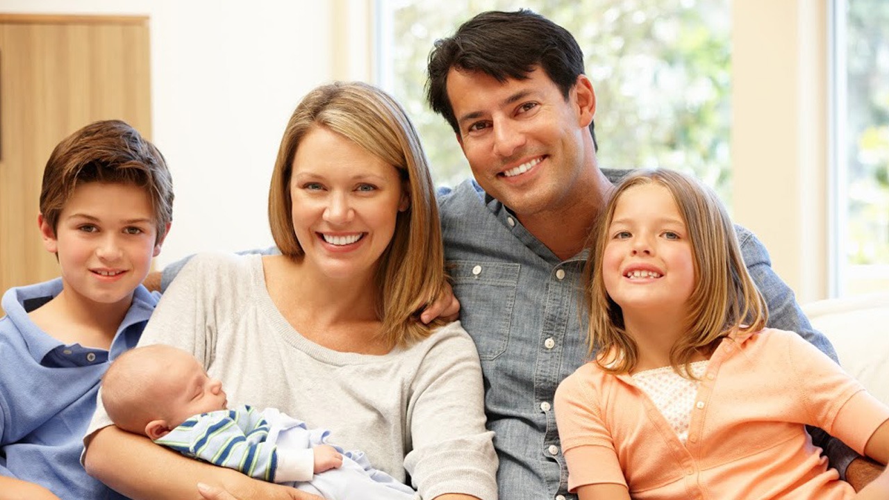 family of two adults and three children