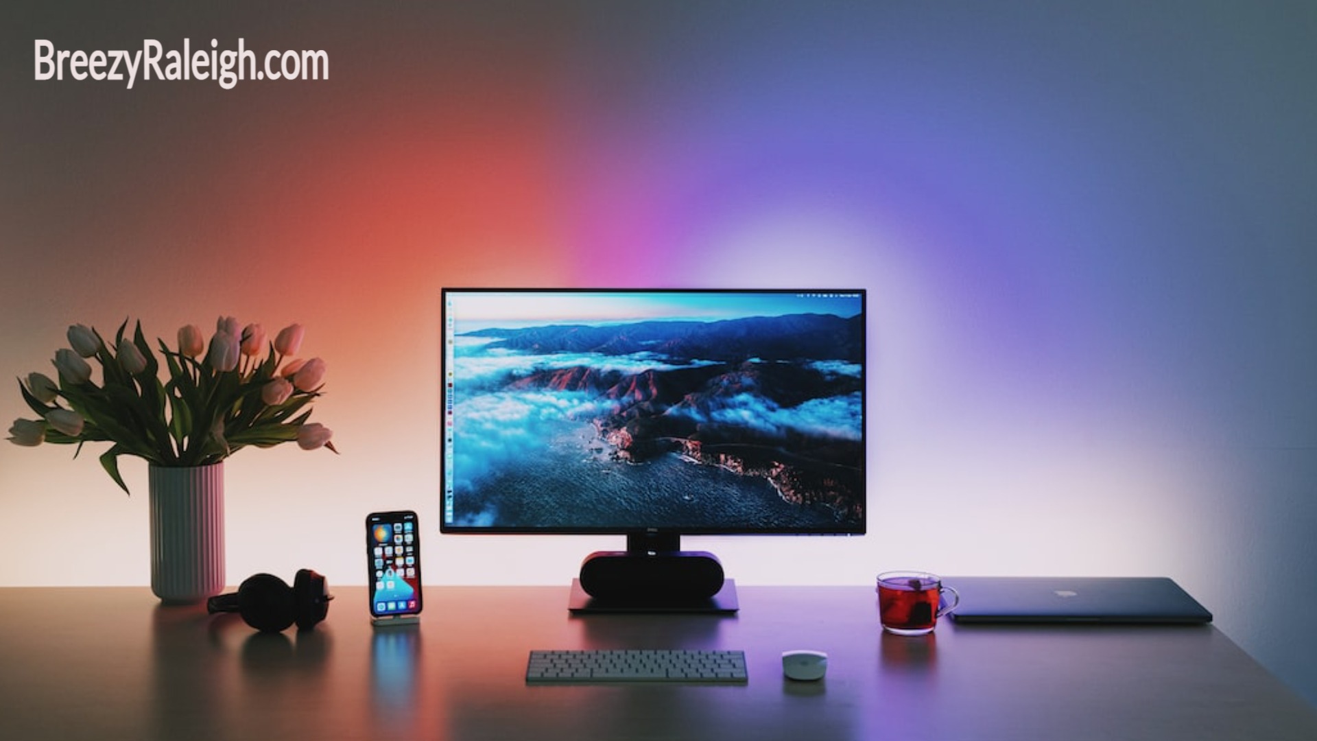 ambient lighting behind desk with electronics