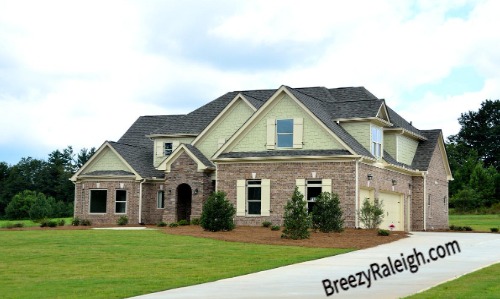 new 2 story home long driveway