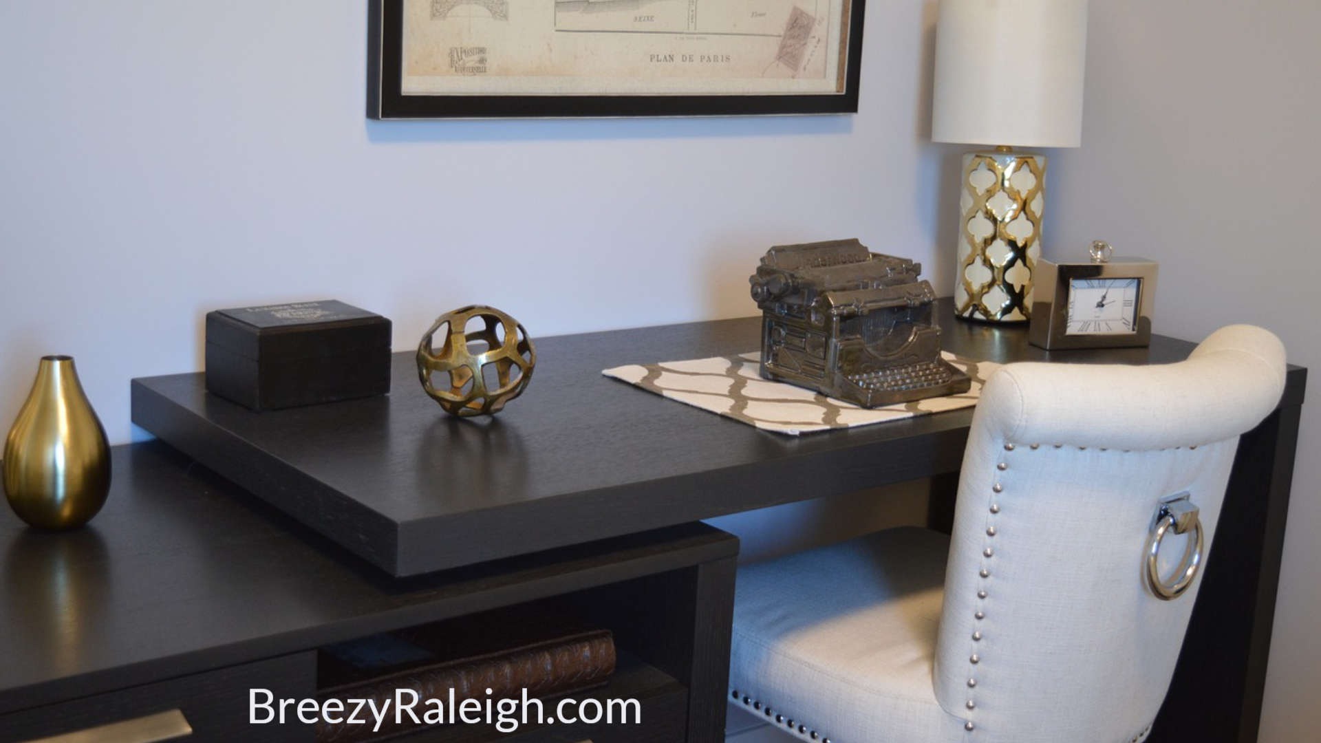 brown wood desk and white leather chair