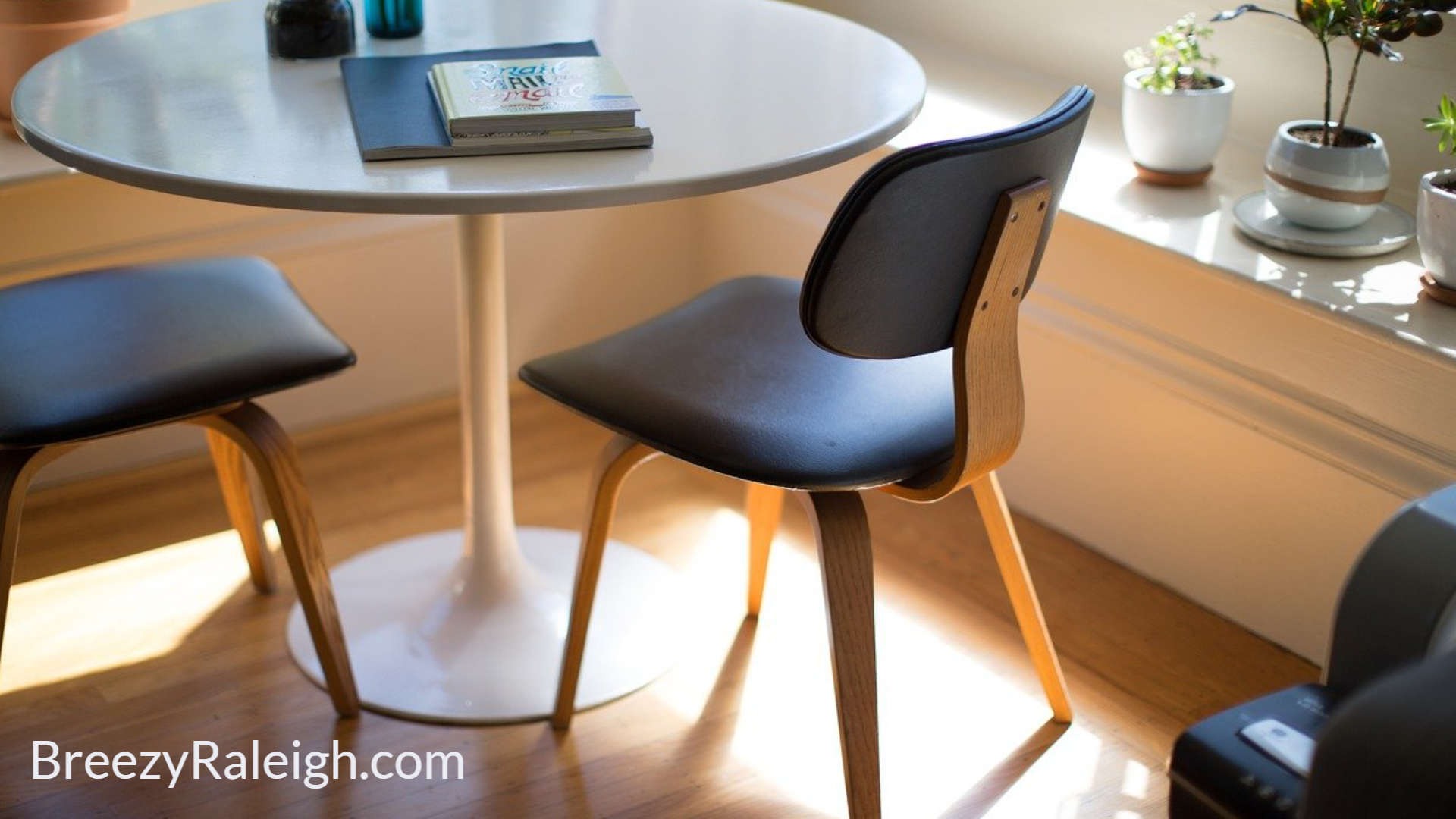 small round office table withtwo chairs