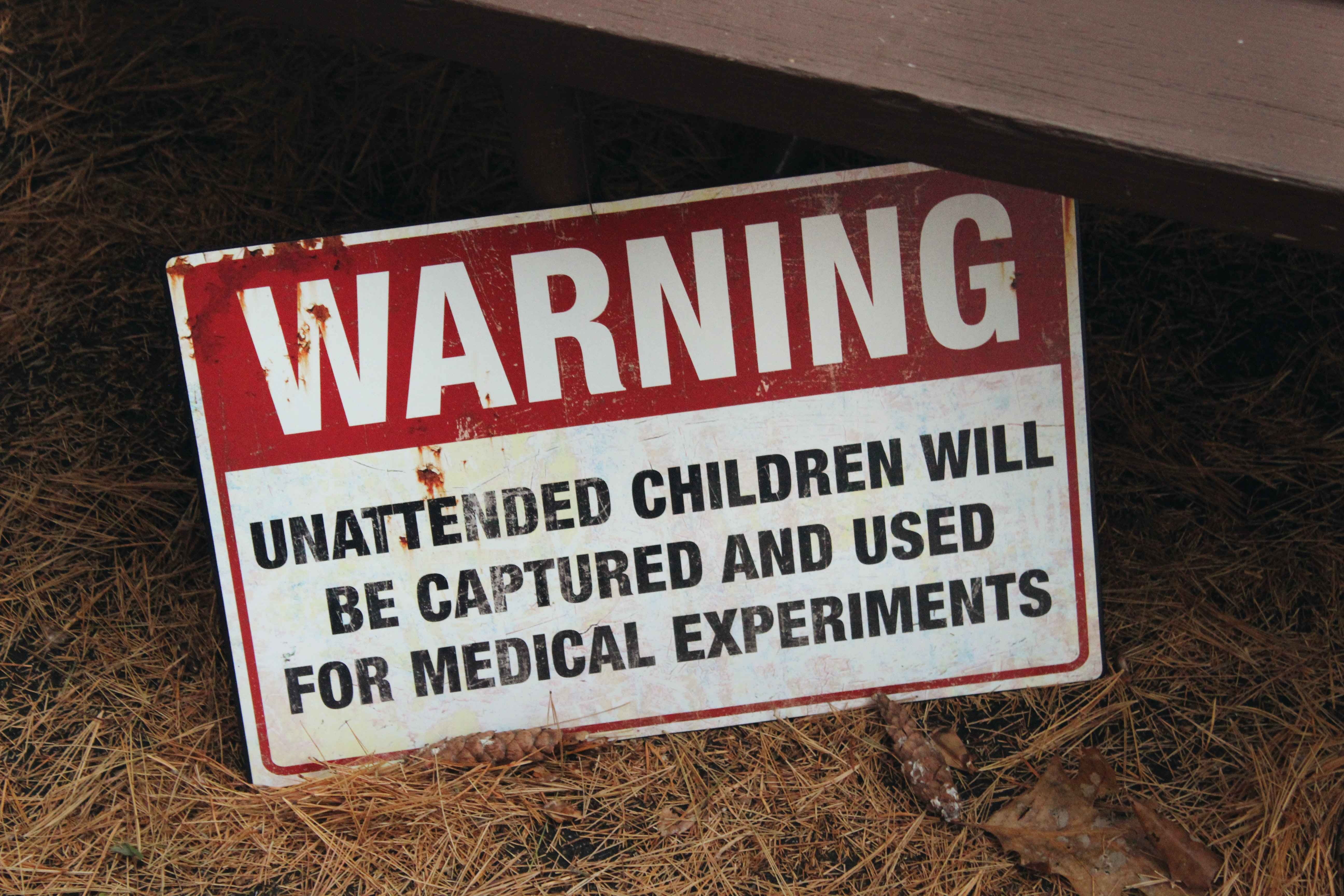 Warning sign about unattended children - scary