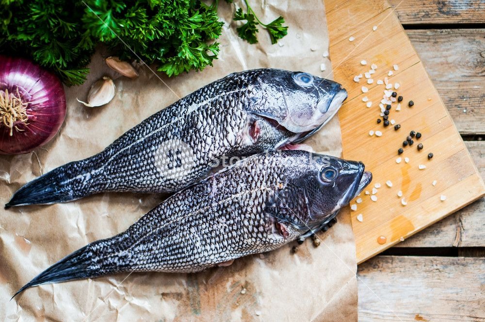 Fresh Sea Bass On Board Before being dressed for cooking