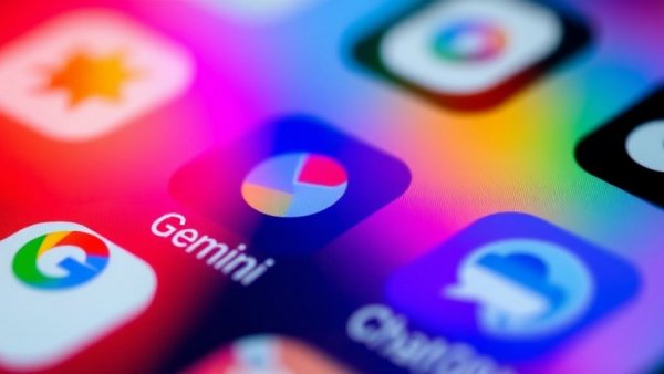 Google Gemini and ChatGPT app icons on screen with colorful reflections.