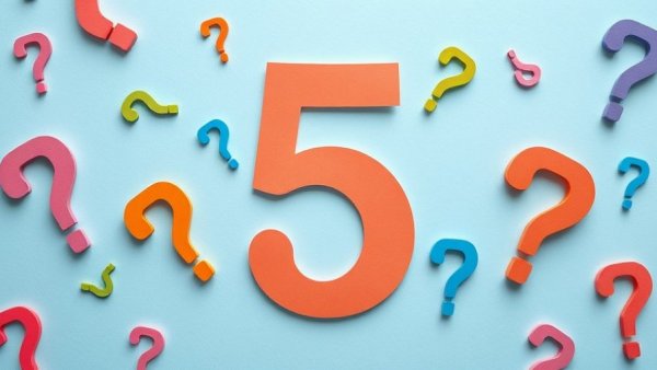 Artistic paper cut number five with colorful questions on blue.