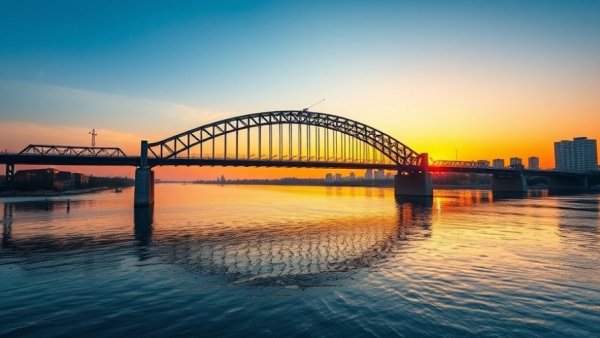 New Jersey infrastructure projects bridge at sunset over river.