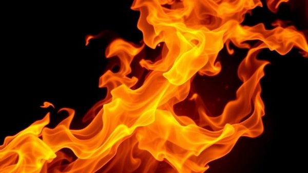 Bright swirling flames in a dark setting, representing new energy.