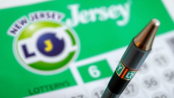 New Jersey Lottery logo with unclaimed tickets.