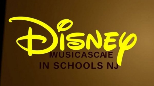 Disney Musicals in Schools NJ logo with yellow background.