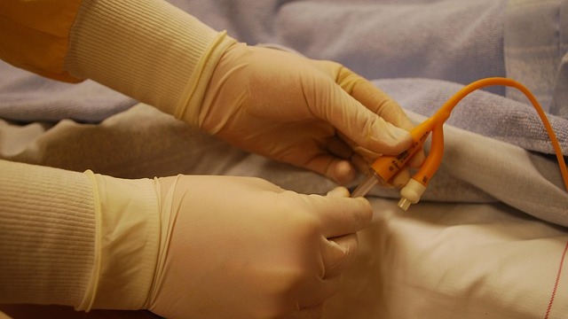 Nurse explaining Foley Catheter Care Steps