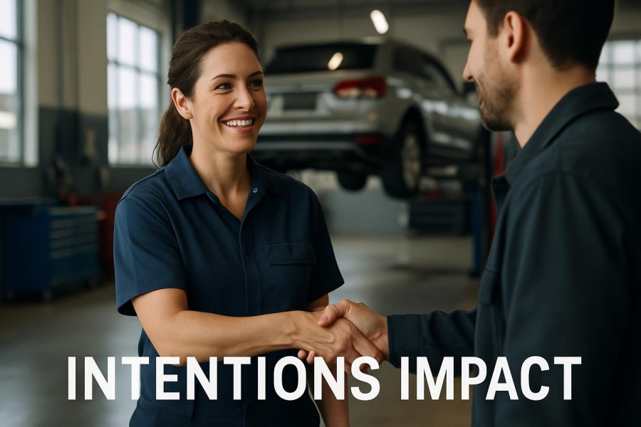 Friendly auto shop owner enhances customer experience with a warm handshake.