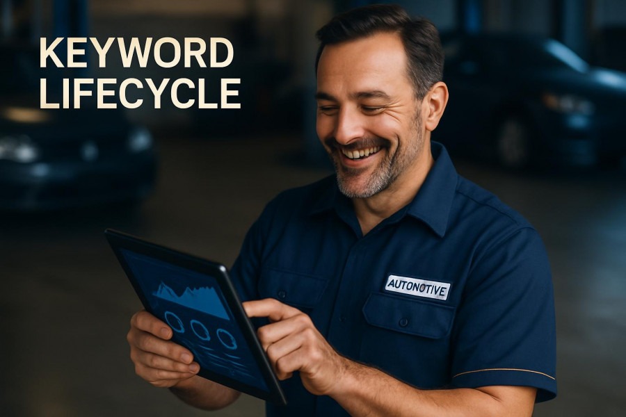 Confident auto repair shop owner smiles while analyzing keyword management data.