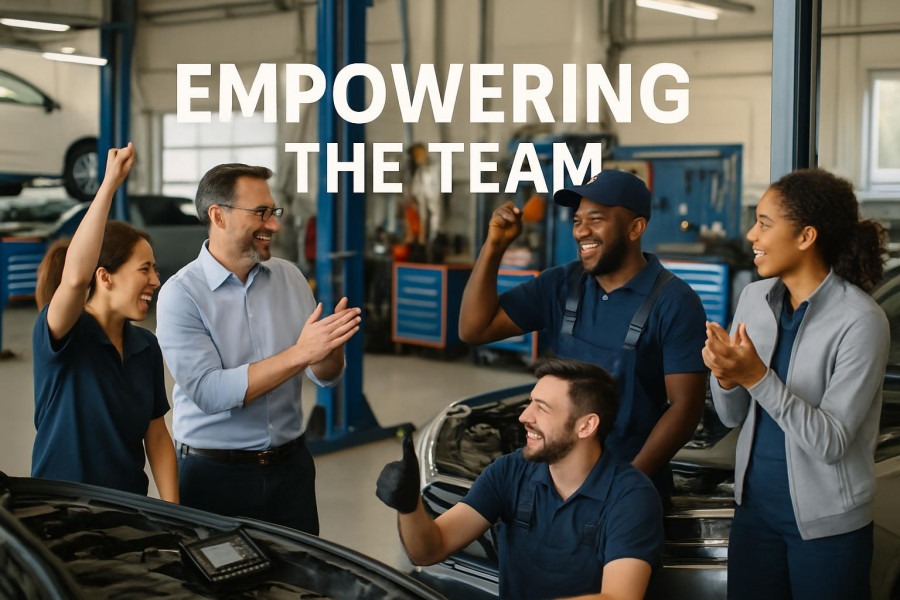 Enthusiastic speaker inspires with auto repair shop team motivation.