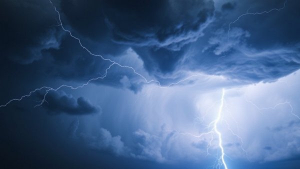 Captivating lightning bolt in stormy sky, storm damage tree maintenance.