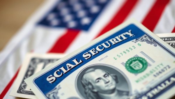 Social Security tax changes 2025: Card, check, and dollar bill.