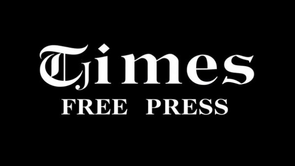 Classic Times Free Press logo in gothic typeface on black