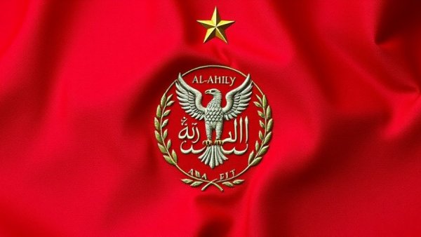 Al-Ahly emblem on maroon fabric emphasizes club identity.