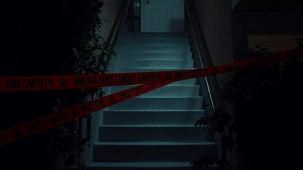 Lake Mary apartments unsafe for occupancy sign on dark stairway