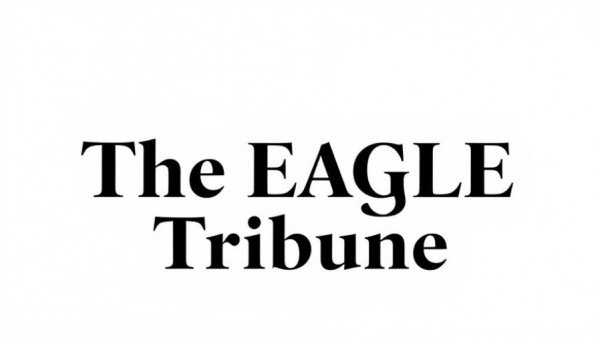 The Eagle-Tribune logo with yellow eagle, bold font.