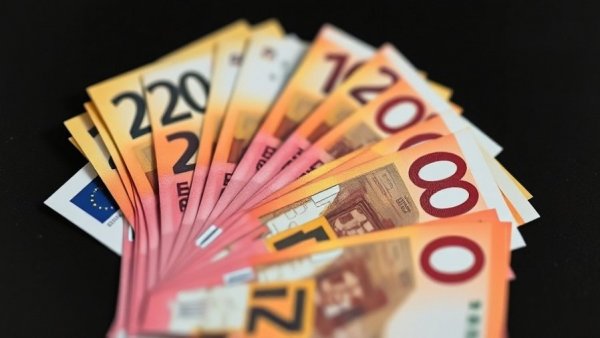 Detailed euro banknotes showcasing intricate designs, highlighting currency value.