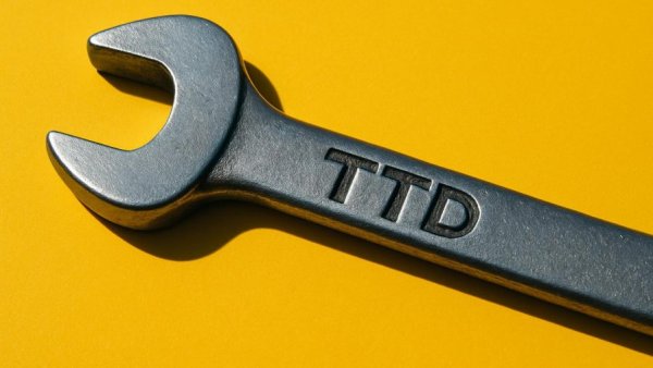 The Trade Desk wrench symbolizing a smaller role in advertising.