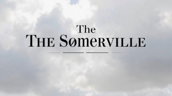 The Somerville Times logo on a cloudy background