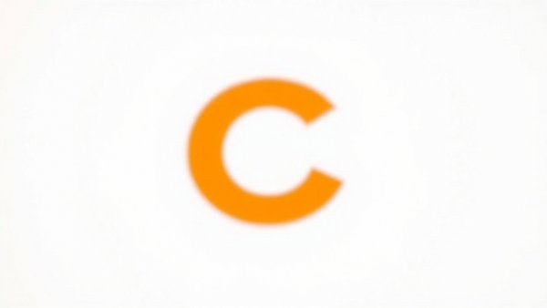 Blurry orange letter C on white background.