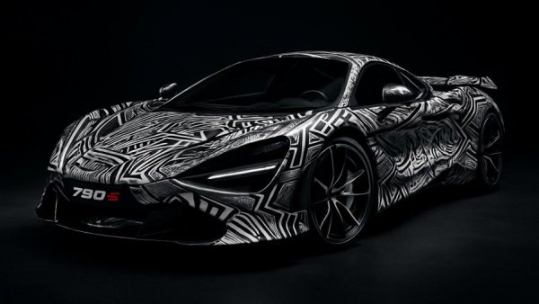 One-Off McLaren 750S with intricate black and white design in dark studio.