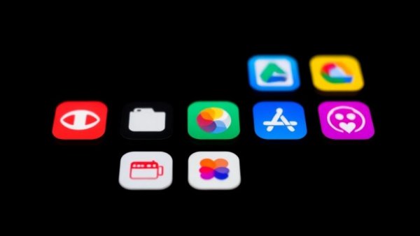 Apple Creator Studio subscription digital app icons on black background.