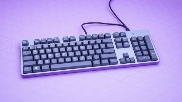 Keychron K2 HE Concrete Edition keyboard on purple pattern.